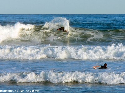 Surfer going off the lip at Ditch Plains in Montauk